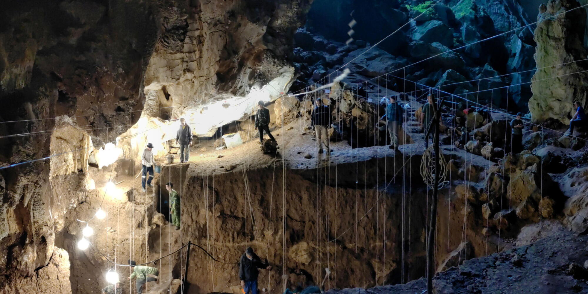 The team excavated through layers of sediments and bones that gradually washed into the cave and were left untouched for tens of thousands of years.  Photo by Fabrice Demeter